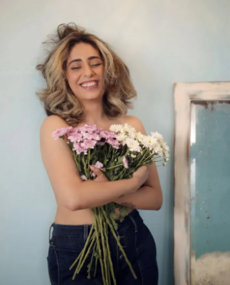 Neha Bhasin Shared Topless Pics | Singer Covered Her Body With Flowers
